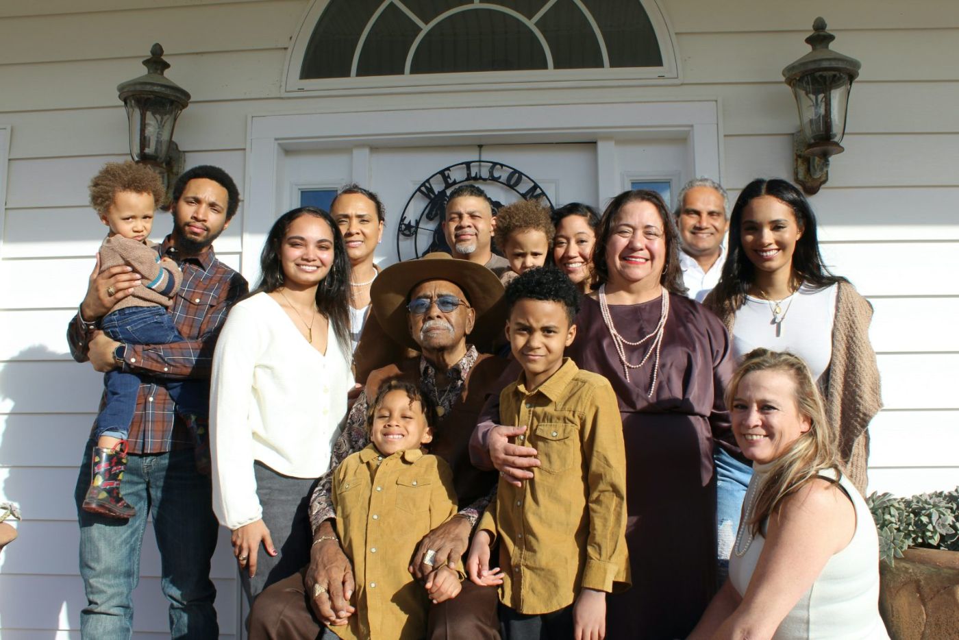 Las Vegas family outside their first home bought with an FHA loan in Henderson, NV