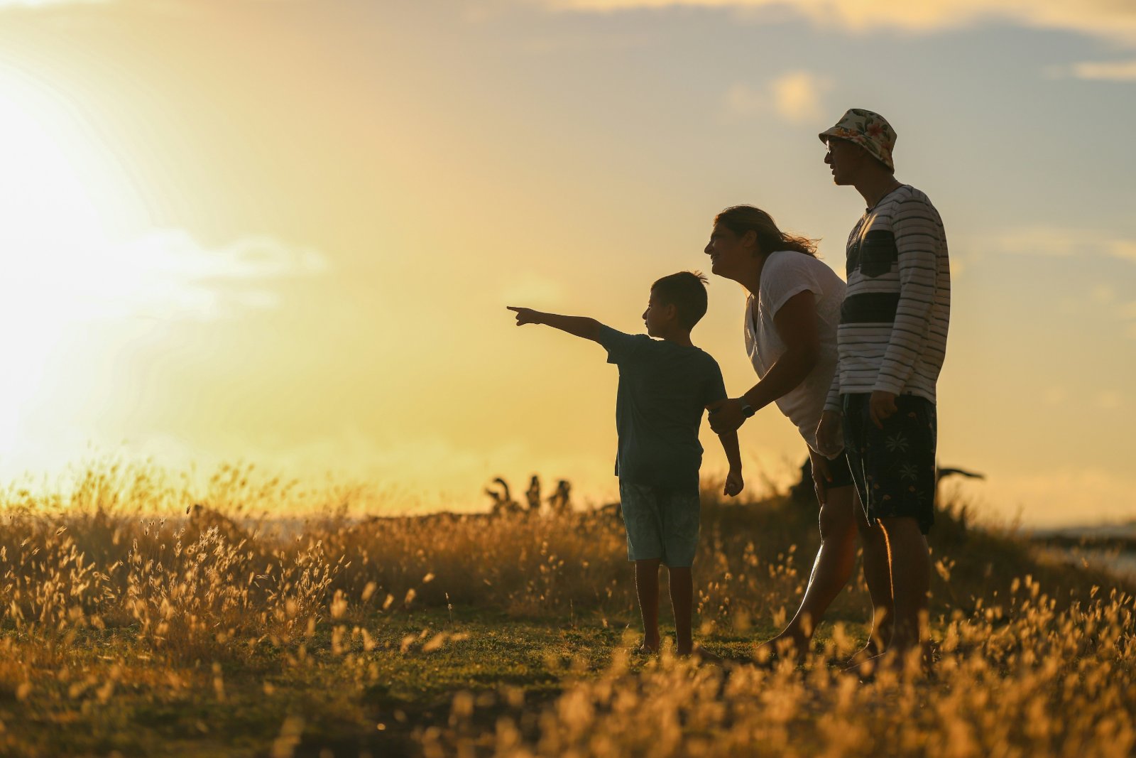 A Las Vegas family at golden hour after buying their first home with an FHA loan